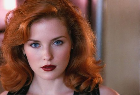 MiamiVice analog photo ginger woman indoors, blue eyes, glossy dark lipstick, ((soft focus, depth of field, film grain, masterpiece, looking at viewer)) <lora:MiamiVicev2-XL:0.4> <lora:EuroBabe-v4-XL:0.6>