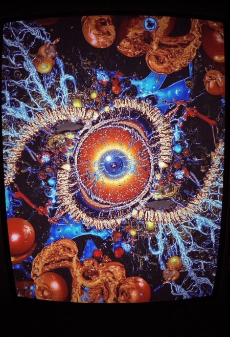 Slot machine graphics from front view . Disturbing scenes of addiction, people injecting drugs heroin, white powder, drinking alcohol smoking cigarettes. very strange surrealist style with holographic vortex featuring swirls of holotropic colour and glowing eyes wet distorted factory shot. On the television sets are glowing hands, with electricity coming off the finger tips. swirling around