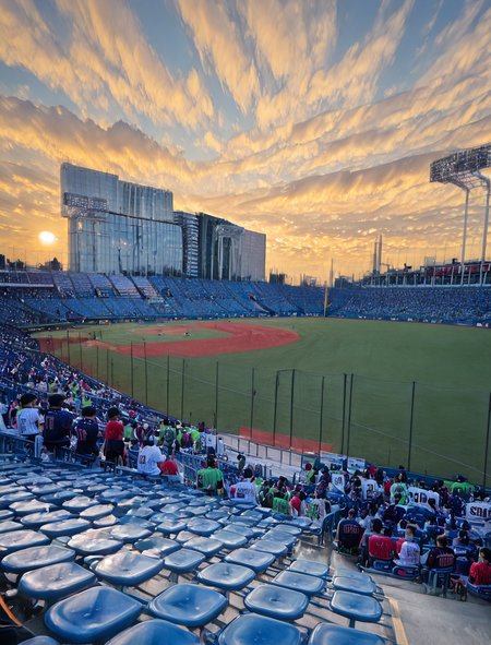 (1girl:1.5), (general:1.3), (detailed background:1.5), baseball jersey, (white jersey, red pinstripe pattern:1.1), dark blue baseball cap, dark blue undershirt, holding megaphone, happy, evening, BREAK
<lora:jingu_stadium:1> jingu stadium, outfield seats, stands, baseballfield, scenery, outdoors, audience, crowd, people, multiple boys, multiple girls, day, sunset, night, cloud, cloudy sky, sky, building, city, cityscape, skyscraper, sign, sun, blue sky, seats, BREAK
dramatic shadows, cinematic lighting, (photo background:1.1), (8K resolution:1.2), (masterpiece:1.2), best quality, amazing quality, very aesthetic, absurdres, newest, (ultra detailed:1.3), (uhd:1.1), <lora:cfg_scale_boost:0.7> <lora:Smooth_Booster_v2:0.5> <lora:StS-Illustrious-Detail-Slider-v1.0:3.0> BREAK