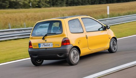 1car, a twingo driving fast on the nurburgring racetrack, from the rear, taillights, <lora:Twingo_SDXL:1>