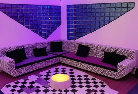 a comfy bar with sofas made out of made out of fractangles, chillout lounge, super cool, dreamy, <lora:PornMaster-Fantasy style-V1:0.7>