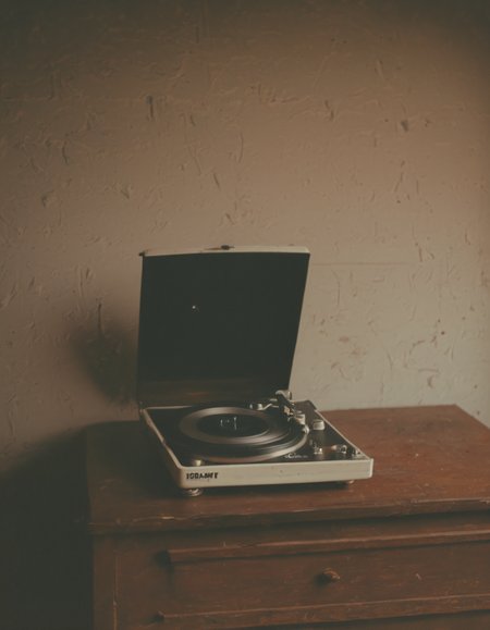 polaroid film photography, faded film, soft focus, 1970s record player in a living room, 4k, uhd, masterpiece