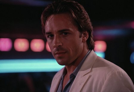 cinematic film still (Sonny Crockett), MiamiVice, indoors, club, neon lights, closeup . shallow depth of field, vignette, highly detailed, high budget, bokeh, cinemascope, moody, epic, gorgeous, film grain, grainy