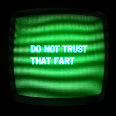 close shot of a crt screen Retro Glitch, low poly green cloud, toilet, colorful, over saturated, desintegrate, trippy_pa style, crt, written "Do Not Trust That Fart"