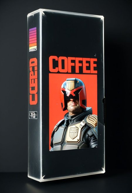 vhs-box, text focus, english text, "I AM THE LAW" text, vhs casette, retrowave, BREAK  judge dredd movie vhs box, jdgdrdd on the cover,  helmet, red eyes, coffee cup, military uniform, BREAK red stripes, sans serif font, retro, logo parody, vhs black case, E-180, logo parody, VHS, "COFFEE" text, handwriting, masking tape overlay, object focus