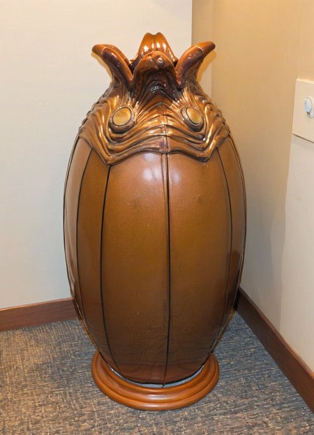 the xenoegg umbrella stand, hallway, door, many umbrellas, 
<lora:Xenomorph_Egg_SDXL:1> xenoegg
