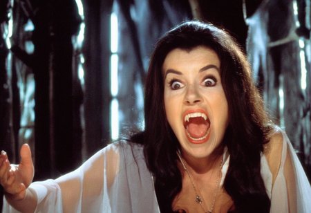 h4mm3r, cinematic close-up face of a pale brunette vampire woman screaming with fangs standing in a dark gothic church, wearing a transparent white dress, dark night, foggy <lora:h4mm3r:1>