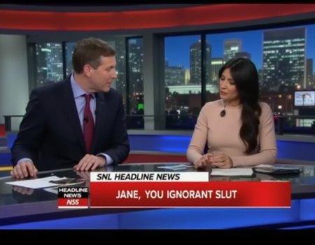 Man and a woman sitting behind news desk on SNL Headline News reading the latest headlines. The TV overlay says "SNL HEADLINE NEWS" with the headline "JANE, YOU IGNORANT SLUT". <lora:Concept_morse-BBCNewsroom-FLUX:1>.