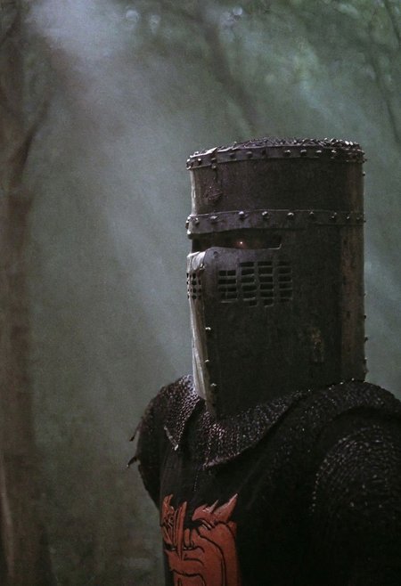 n-eeyblch, Dark Photo of creepy Vintage black Knight,
very detailed, atmospheric haze, Film grain, cinematic film still, shallow depth of field, highly detailed, high budget, cinemascope, moody, epic, OverallDetail, gorgeous, 2000s vintage RAW photo, photorealistic, candid camera, color graded cinematic, eye catchlights, atmospheric lighting, skin pores, imperfections, natural, shallow dof