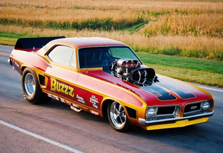 VintageMuscleCar gleaming colorful dragster, road, landscape, 4K, highly detailed, closeup (stylish grainy analog film photo 35mm, "BUZZ")