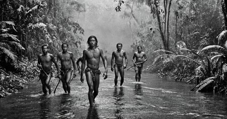 black and white photograph of few indigenous people hunting in the amazonian rain forest, insane details, dramatic lights, high definition, 35mm camera, film photography style, heavy grain, ral-chrosc-bw, masterpiece, national geographic style, strong vignette, high contrast