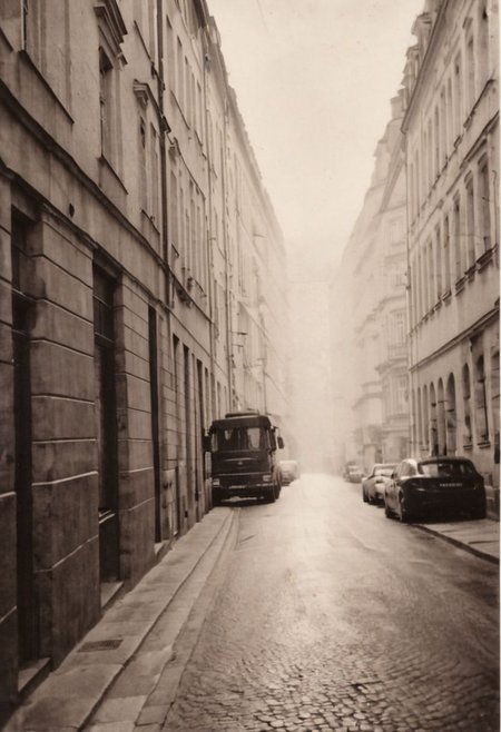 lith_agfabrovira_BH21, instagram photo, a dark and foggy street somewhere in europe, hard shadows, film grain