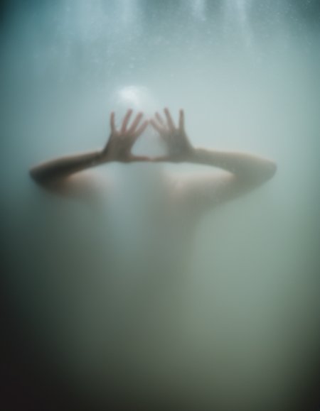 cinematic film still a woman's body is shown through a ((wet foggy glass:1.2))window, hot shower steam, underwater:1.2, air bubbles, Fiona Stephenson, swirling mist, art photography . shallow depth of field, vignette, highly detailed, high budget, bokeh, cinemascope, moody, epic, gorgeous, film grain, grainy
