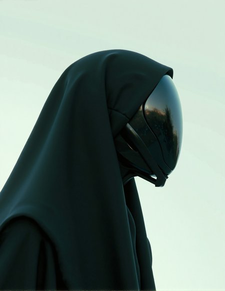 UNI_SCI_FI The image presents a sleek, mysterious robotic figure, draped in a flowing black hood. With an exquisite glossy finish, the head reflects light delicately, creating an entrancing effect. The soft, minimalistic background enhances the subject’s futuristic charm, inviting viewers to ponder the blend of technology and artistry. The atmosphere is both serene and thought-provoking, embodying an innovative Midjourney style that evokes feelings of curiosity and awe. The interplay of shadows and highlights adds depth, emphasizing the unique design. This artwork is a beautiful depiction of modern aesthetics and futuristic themes.