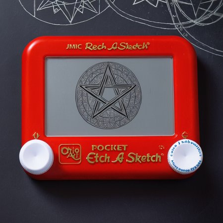 A photo of a red Etch A Sketch toy. The toy is laying on a dark background. The screen of the Etch A Sketch has a drawing of a pentagram.  <lora:Etch_A_Sketch-000009:1>