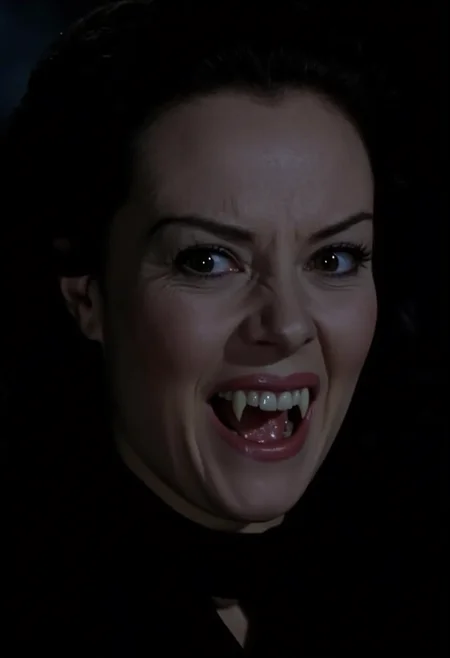 close-up face shot of an aristocratic vampire woman sneering showing fangs, face filling the whole frame. Pale skin, dark clothes, dark hair, neutral black background. Low light at night   <lora:hammer-000073:1>
