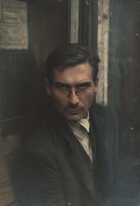 50 years old, elegant, wealthy man, servant, dark longer hair, clean-shaven, honey eyes, pondering facial expression, in his hands an elegant black cane with a knob looking like a lions head, beautifully carved out of ivory, wearing a white shirt and an elegant dark blue suit, a bowler hat on his head with a small blue feather, a watch on a chain, thin glasses on his nose old-fashioned shiny frame, standing in front of the entrance to the bank, full body, portrait, 35 mm f 1.8 lens, gentle morning light,,<lora:Vintage_Street_Photo:0.8> 
BREAK