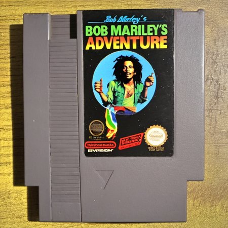 <lora:nes:1>  nes video game cartridge, Bob Marley's Adventure, english text, no humans, solo,  parody