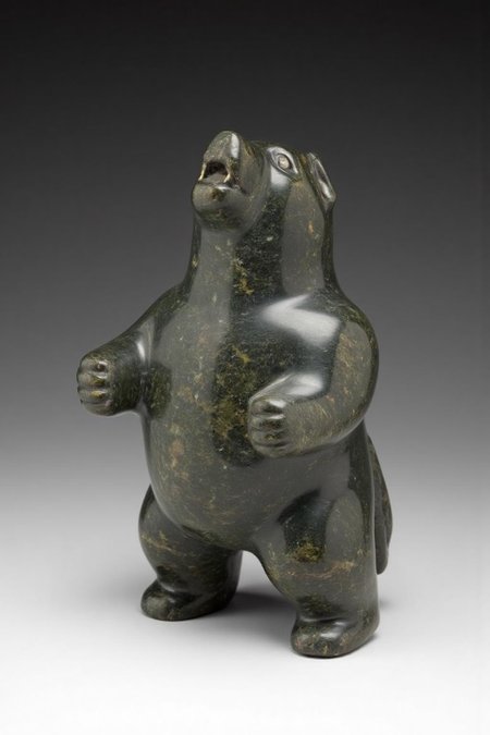 Inuit sculpture of a dog howling. <lora:inuit_cap_d6a3e12:1.0><lora:821715093269211146:0>