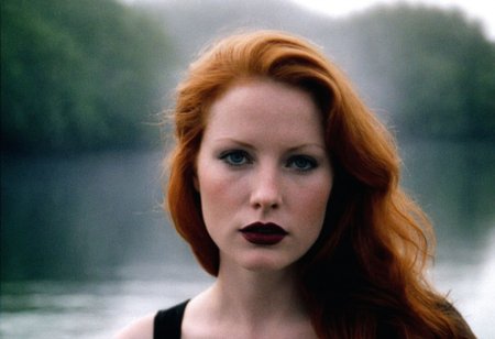 CinematicPortrait woman analog photo ginger (provocative  )  masterpiece outdoors, (glossy dark lipstick), grey eyes, (foggy lakeside), soft focus, depth of field, film grain, (((looking at viewer))) <lora:CinematicPortraitXL_v3:0.25>  <lora:EuroBabe-v4-XL:0.35>