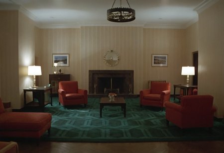 room 237, living room, indoors, Overlook Hotel, CineShining, highly detailed, 4K, (stylish grainy analog 35mm film photo)