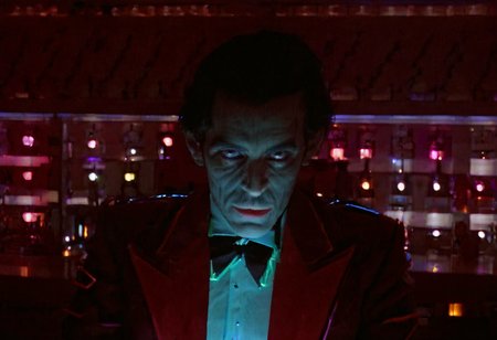 bartender, man, closeup, evil look, bar, neon light, Overlook Hotel, indoors, highly detailed, 4K, ((grainy 35mm photo))