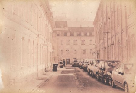 lith_argenta_Brom_Spezial_BBS151, instagram photo, a foggy street somewhere in europe, hard shadows, film grain
