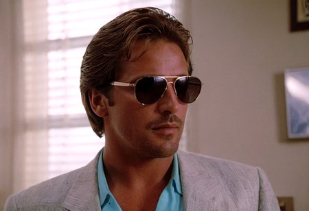 MiamiVice, Sonny Crockett, man, shades, closeup, office, back light, indoors, highly detailed, 4K, ((stylish grainy analog 35mm photo))