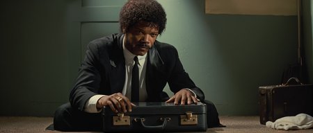 cinematic film still of  <lora:Pulp Fiction style:1>
Jules Winnfield a man is holding an open suitcase,black hair,1boy,holding,sitting,weapon,male focus,gun,facial hair,handgun,realistic,revolver , 1990's, 90's, film, cinematic, crime and violence, classic, graphic violence, Kodak film, motion picture image,Pulp Fiction style, Pulp Fiction Film style, shallow depth of field, vignette, highly detailed, high budget, bokeh, cinemascope, moody, epic, gorgeous, film grain, grainy