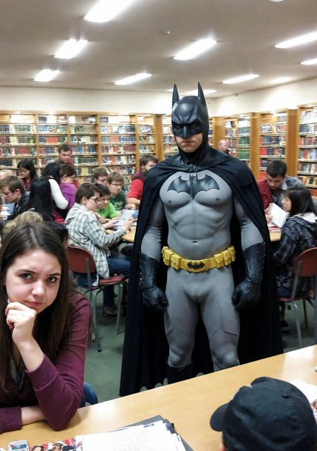 amateur photography,
<lora:badquality_v02:1.2>, low quality, bad quality, 
embarrassed batman  in busy crowded library
surrounded by people, men and women