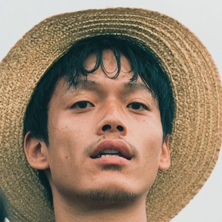 portrait photograph of Monkey D Luffy wearing a straw hat watching a concert, Zenit 35mm