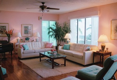 MiamiVice, living room, indoors, highly detailed, 4K, (bright stylish grainy analog 35mm film photo)