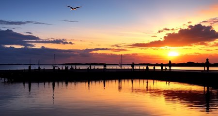 ((masterpiece)), (realistic), (sunset:1.2), (seascape:1.2), (colorful sky), (seagulls:1.1), (beach:1.1), (waves:1.1), (rocks:1.1), (boats:1.1), (reflection:1.2), (silhouette:1.2), (harbor:1.2), (peaceful:1.1), (serene:1.1), (tranquil:1.1), (calming:1.1), (harmonious:1.2),
The sun was setting over the horizon, painting the sky in a breathtaking array of colors. Shades of pink, orange, and yellow blended together to create a vibrant and colorful sky. Seagulls flew gracefully overhead, their wings casting shadows on the calm waters below. The beach was a peaceful and serene place, with waves gently lapping at the shore. Smooth rocks scattered along the coastline, providing a perfect spot for a quiet moment of reflection. Boats floated in the harbor, their masts creating silhouettes against the colorful sky. The reflection of the sky in the water created a harmonious and tranquil atmosphere. As the sun disappeared below the horizon, the sky turned darker, but the sense of calm remained, leaving a feeling of peacefulness and contentment.