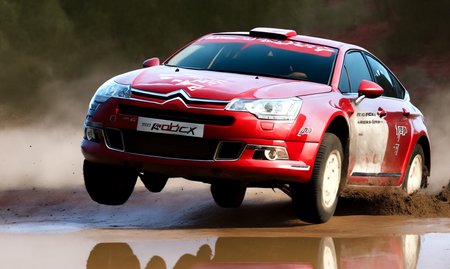 red rally car c5x7 (jumping over a ramp:1.2), mud, puddle, dirt, damaged