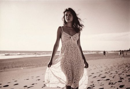 lith_argenta_bromBN1W, instagram photo, full photo of 26 y.o american woman walking on a beach, summerdress , perfect detailed eyes, natural skin, hard shadows, film grain