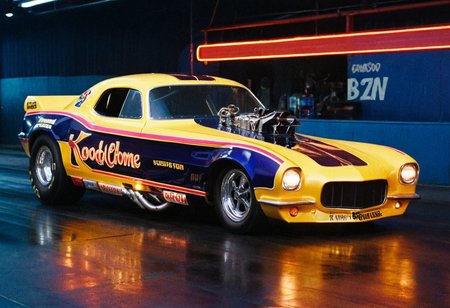 VintageMuscleCar gleaming dragster tunnel, side view, bright headlights, neon lights, glass background, light reflections, 4K, highly detailed, closeup (stylish grainy analog film photo 35mm vintage Kodachrome, "BUZZ")