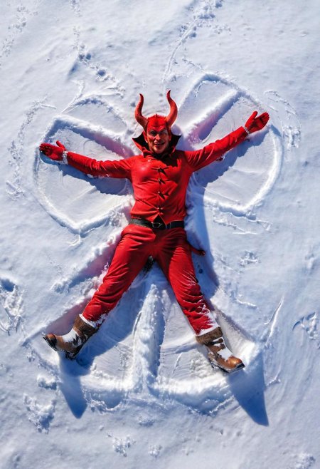 A ((devil)) lying on the snow, moving legs and arms, (((making snow angel))),  aerial view, looking at viewer
<lora:add-detail-xl:1> <lora:xl_more_art-full_v1:0.5> <lora:looking_at_viewer:2>