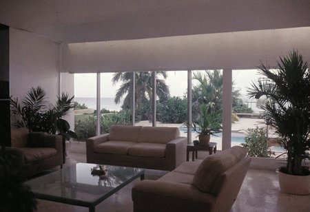analog film photo MiamiVice, indoors . faded film, desaturated, 35mm photo, grainy, vignette, vintage, Kodachrome, Lomography, stained, highly detailed, found footage