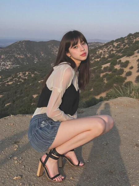 There are wonderful studio lights and various reflections,
18yo beautiful cute girl with blushing and female orgasm.skin naturally showing the texture of blood vessels and detailed pale skin,
--,
<lora:Nakajo_Ayami_f1:1>,she is Nakajo Ayami,
(Chiffon_blouse:1.5),(Pleated_culottes:1.4),(Strappy_block_heels:1.3), Canon EF 600mm lens photo,she is in the center of the picture,the background is the Hollywood Hills,and there text 'buzz me please' on the Hollywood Hills,,#å¥½è±åå±±600mm