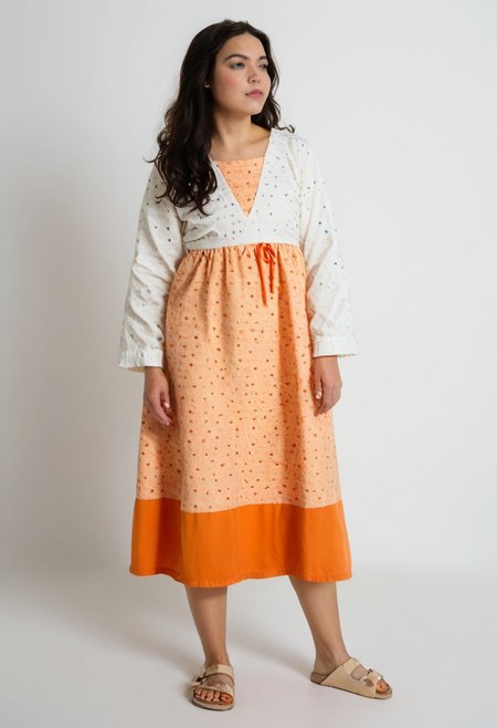 1girl, solo, simple_background, white_background, birksonfeet, toenail_polish, full_height, patterned, long_dress, long_black_hair, looking_away, pretty_face, long_sleeves, orange_black_white, posing, fashion