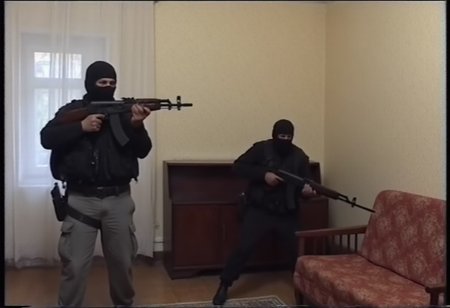 35mm photograph, slightly blurred background, camera from bottom, close quarter battle in post-soviet apartment, special forces with black balaclavas on heads and armed ak-47 rifles making assult