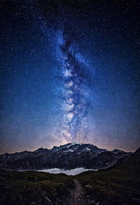 Alpine moutain range at distance under a protected Dark Sky. the bands of the milky way. Milky Way, Night sky