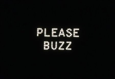 it says "please buzz" in plain white text on a black background