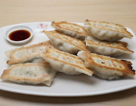 A delectable presentation of gote (dumplings) beautifully arranged on a plate. The gote are golden brown, freshly cooked with visible pleats, and garnished with herbs or a dipping sauce. The plate is set on a table with elegant tableware, perhaps with chopsticks or a traditional serving spoon. The scene should be as vivid and appetizing as a high-resolution photograph in a gourmet magazine, with warm and inviting lighting that emphasizes the texture and color of the gote , the shine of the sauce, and the elegance of the presentation, <lora:GT:0.75>,