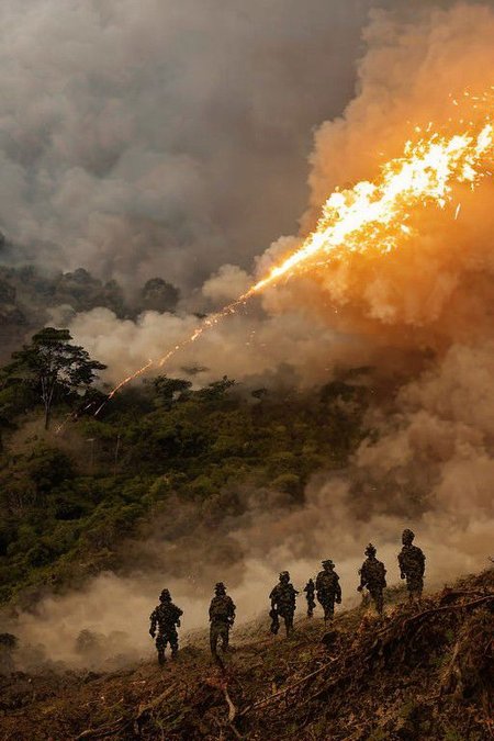 close up six soldiers on high alert . Flying Dirt, Smoke, Fire, Debris, Explosive Shockwaves, Shattered Fragments, Blazing Embers, Searing Heat, Chaotic Movement, Scattered Ashes, Resonating Boom, Ring of Fire, Glowing Sparks, Intense Illumination, Shockwave Ripples, Charred Remnants. dark cloud, dark sky, dirt, fog, grass, gravel, heavy black smoke, mountain, mud, soldier in a rainforest, thick smoke, trees, tundra, white smoke Soldiers on high alert navigate the dense rainforest of a warzone, Moonlit Shadows, Dirt, Survival, Explosions, Tension, Shattered Fragments, surrounded by swirling smoke and debris. The terrain, Searing Heat, War-Torn, Military Operation, Emergency Services, Dystopia, Darkness, the soldiers remain vigilant, Conflict