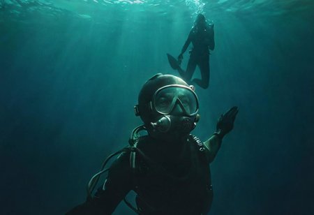 Lowlight dark Pastel Tone, super Closeup Portrait, very Detailed, awesome Quality, reflecting, luminescent, translucent, Ethereal, Aura, 70s vintage James Bond  diver in deep Green blue sea, diving fins, upside down, Diving down, deep blue, endless deep dark sea, sideview, simple Silhouette, DARK dystopian Blade Runner Flair, dynamic Scene, very detailed, uhd, masterpiece, White smoke, light beams through smoke,