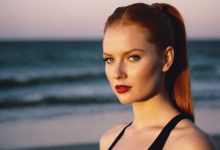 CinematicPortrait woman analog photo ginger provocative slavic  ponytail masterpiece outdoors, (glossy dark lipstick), grey eyes, (seaside beach sunset), soft focus, depth of field, film grain, (((looking at viewer))) <lora:CinematicPortraitXL_v3:0.35>  <lora:EuroBabe-v4-XL:0.25>