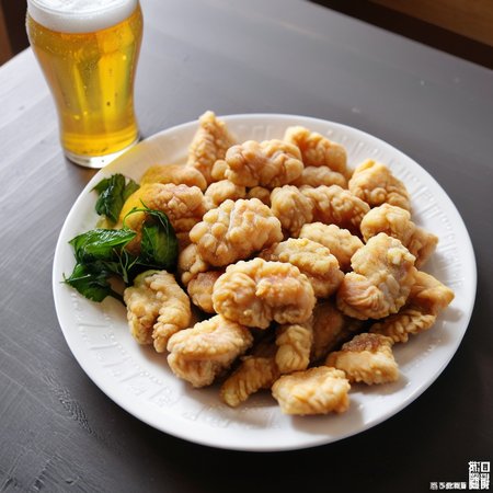 Create a realistic photo of a plate of twgensouge with a beer .  <lora:twporcon:0.85> ,<lora:twbeer3:0.65>,