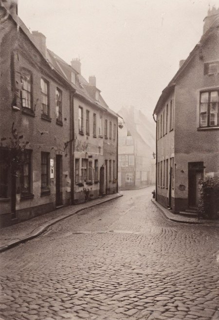 lith_argenta_BH119w_hart, instagram photo, a foggy street somewhere in germany, small city, hard shadows, film grain