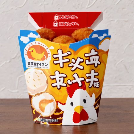 A photorealistic image of a box of delicious chicken nuggets with a cute chick illustration on the exterior. The chicken nuggets inside should be golden brown, crispy on the outside, and tender on the inside. The chick illustration should be playful and appealing, possibly showcasing a happy, cartoonish chick. The setting should be on a dining table, with perhaps a soft drink or side dish in the background. The lighting should highlight the texture and color of the chicken nuggets, making them look appetizing, while also emphasizing the cute design on the box. , <lora:lawsonkara:0.75>,((bagkara))
